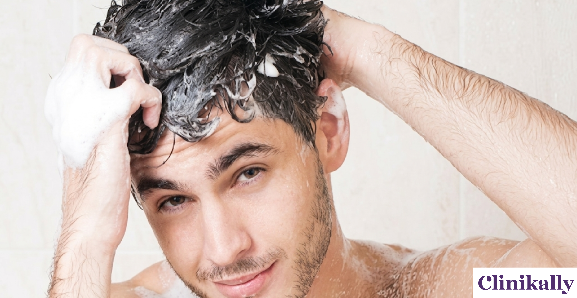 Man washing hair with a shampoo