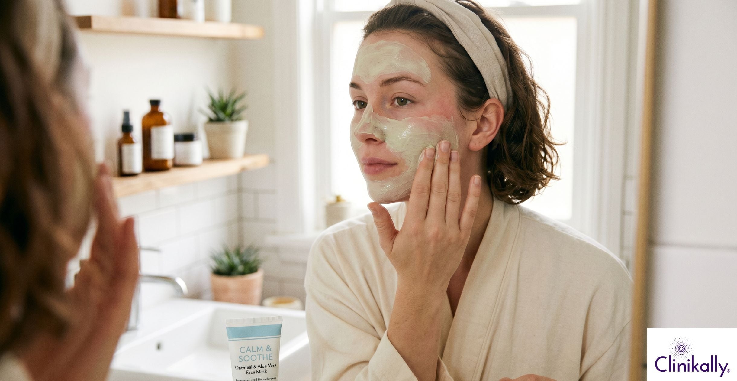Woman applying soothing face mask for sensitive skin