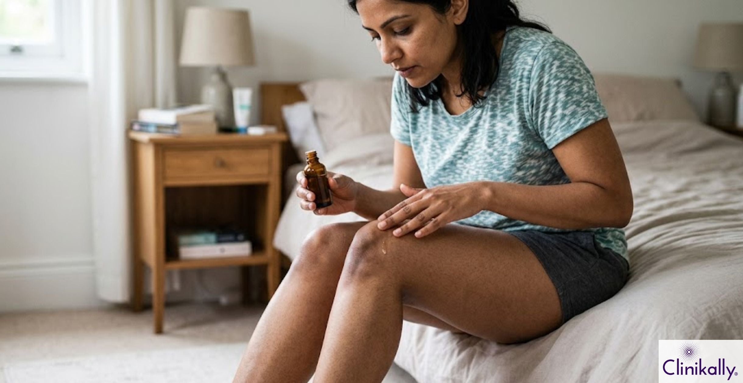 Applying oil to dark knees