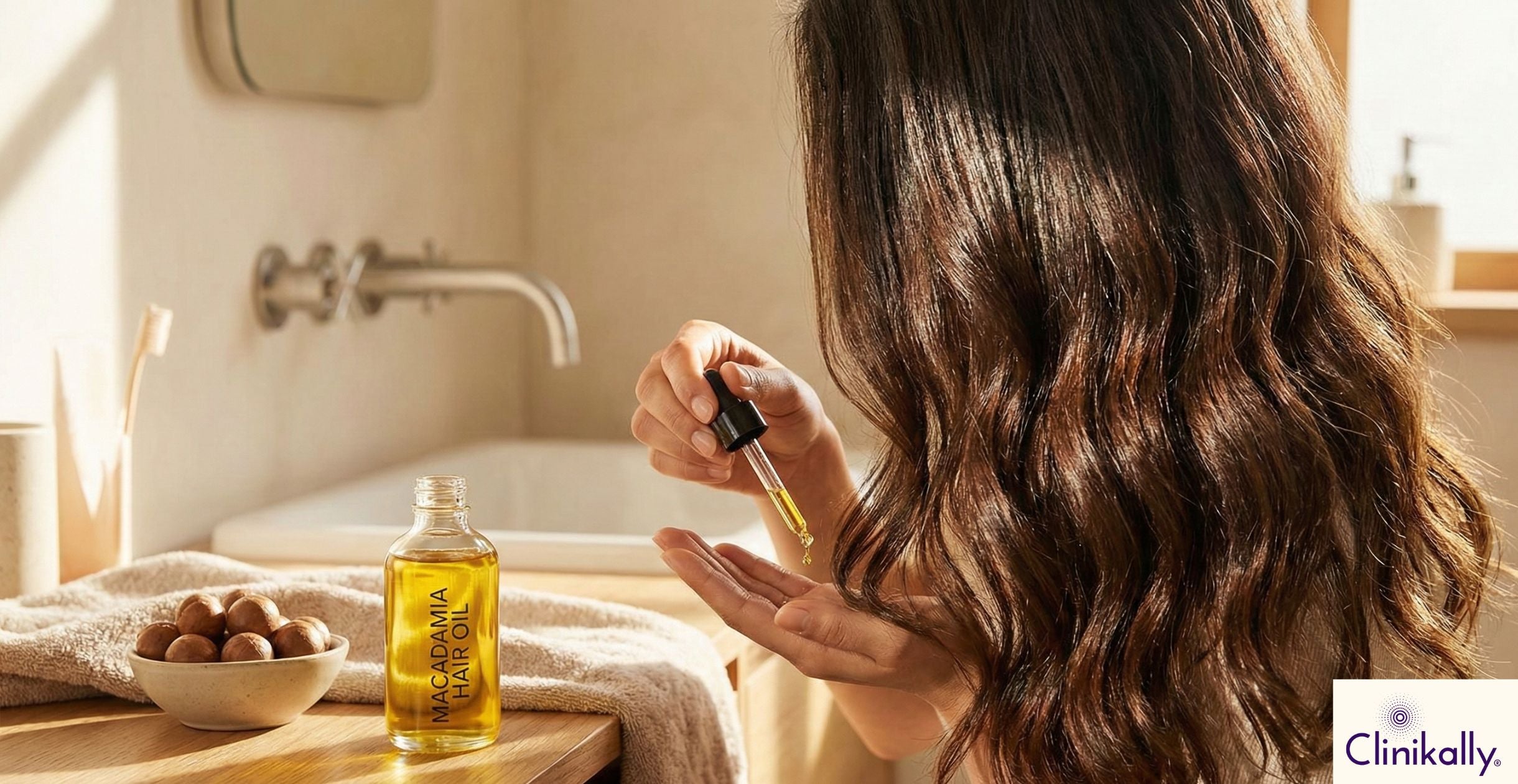 Woman applying Macadamia oil to hair