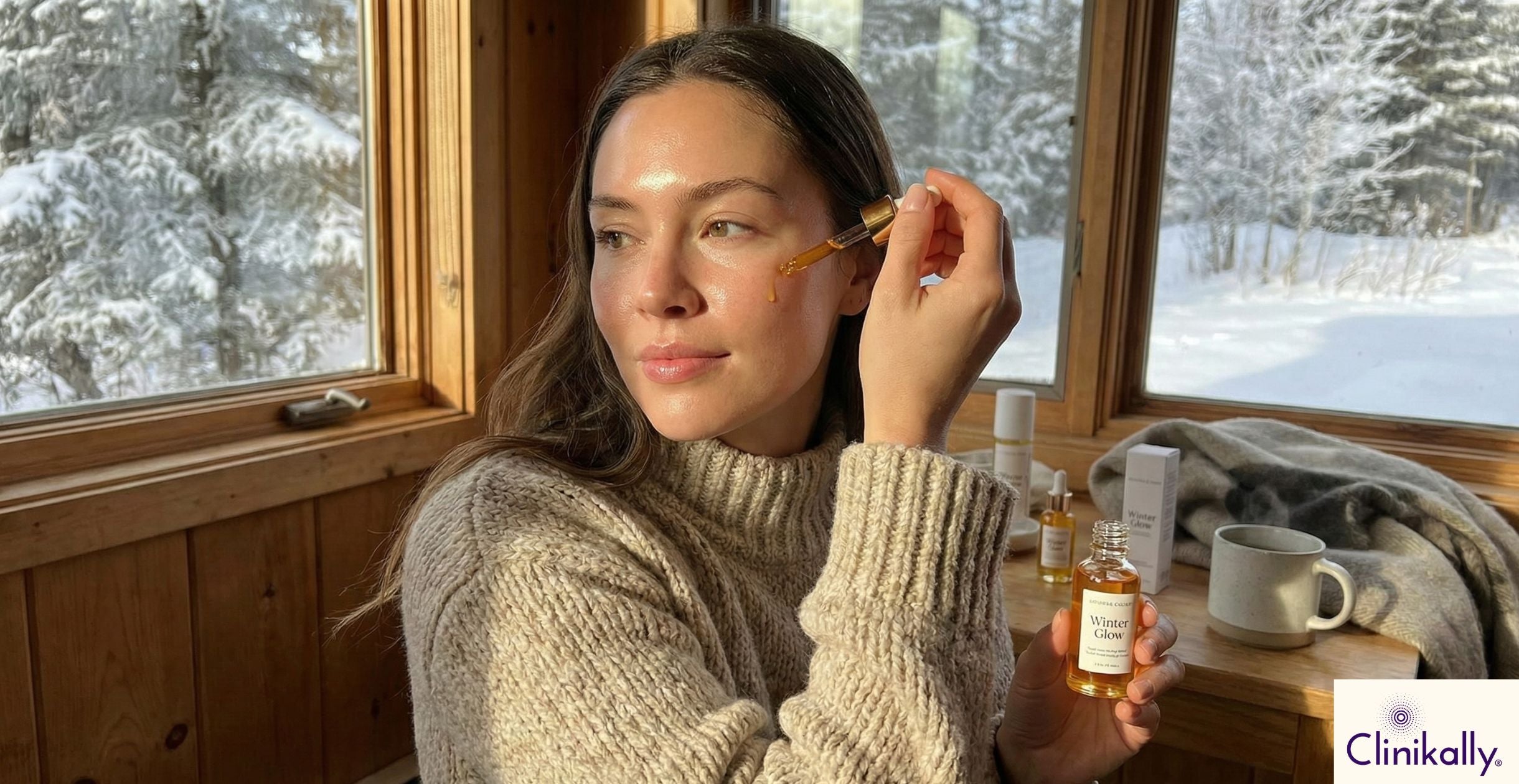 Woman applying oil on her winter dry face